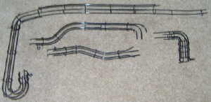 Powder coated pinball machine rails